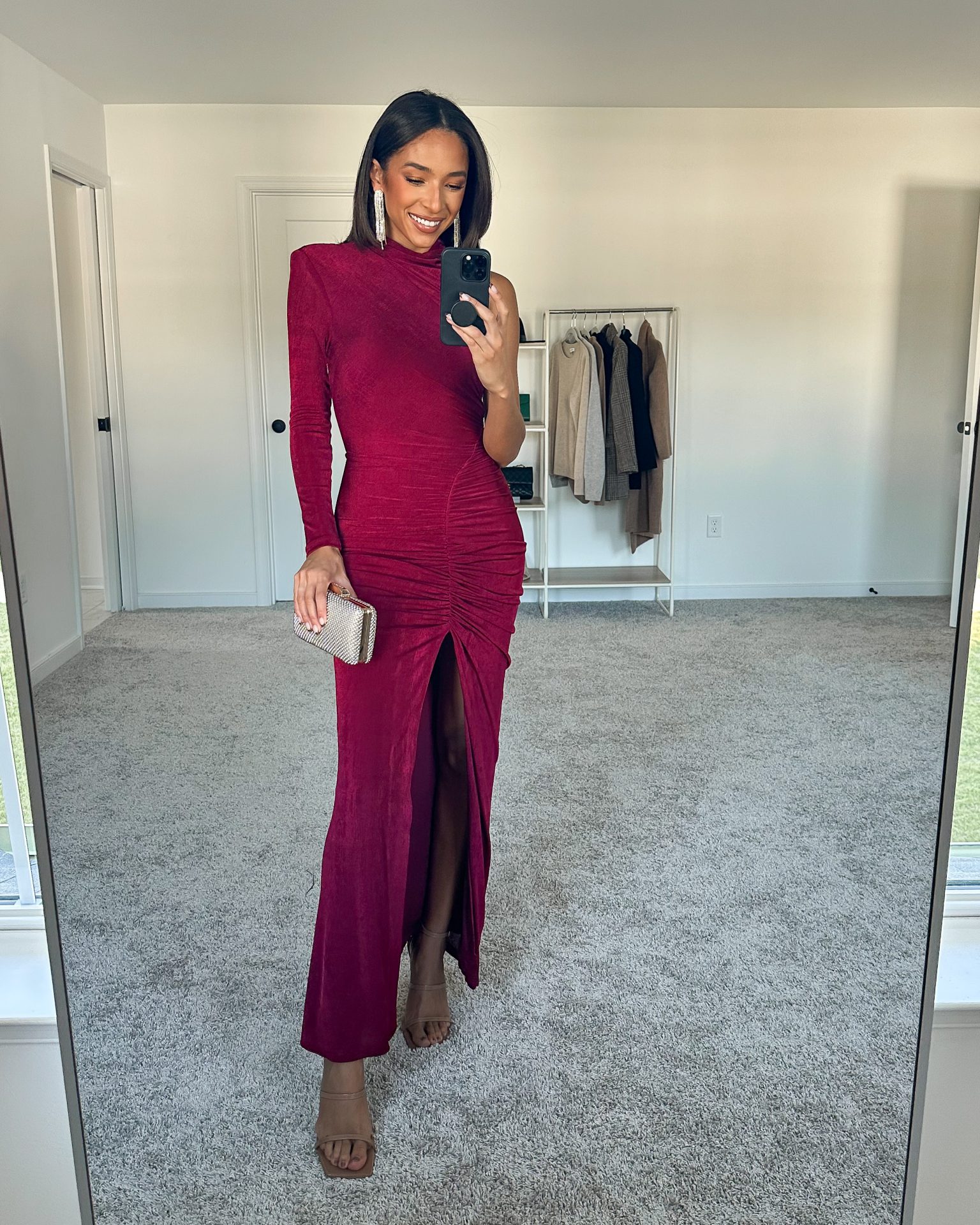 LaKendra wearing a berry long sleeve gown for a black tie fall wedding 